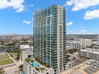 Aerial view of a modern highrise building with pool at 777 N Ashley Dr # 1606, Tampa, FL 33602