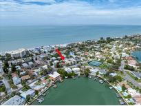 Aerial view highlighting condo's location near beach and water at 2704 2Nd St # 7, Indian Rocks Beach, FL 33785