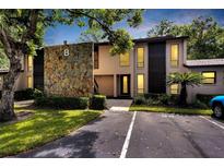 Condo building exterior at night at 1400 Tarpon Woods Blvd # B5, Palm Harbor, FL 34685