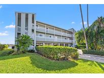 Two-story building with balconies and landscaping at 2505 Bay Blvd # 1, Indian Rocks Beach, FL 33785