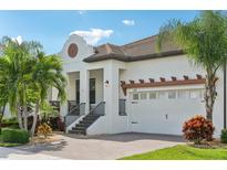 Two-story house with Spanish-style architecture at 1029 Seagrape Dr, Ruskin, FL 33570