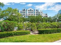 View of Island Bay condominium building from landscaped grounds at 2333 Feather Sound Dr # B505, Clearwater, FL 33762