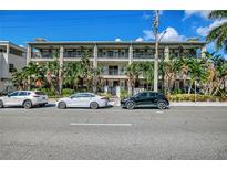 Beautiful condominium with lush tropical landscaping, multiple floors, and balconies provides a comfortable living space at 201 6Th S St # 106, St Petersburg, FL 33701