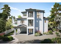 Two story home with gray siding and a charming front porch at 625 80Th Ave, St Pete Beach, FL 33706