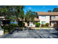 Front view of townhome with parking at 3845 Sailmaker Ln, Holiday, FL 34691