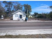 Charming single-story home with peaked roof and a 'For Sale' sign in the front yard at 2001 15Th S Ave, St Petersburg, FL 33712
