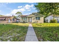 Charming bungalow with walkway and landscaped yard at 3457 22Nd S Ave, St Petersburg, FL 33711