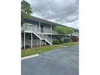 Two-story building with stairs and landscaping at 5900 5Th N Ave # D6, St Petersburg, FL 33710