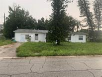 One-story home with a large yard needing landscaping at 1908 51St W Ave, Bradenton, FL 34207