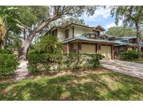 Two story home with two car garage and lush landscaping at 1500 Mahogany Ln # 605, Palm Harbor, FL 34683