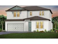 Two-story home with white siding, brown roof, and landscaping at 13728 Evergreen Valley Dr, Riverview, FL 33578