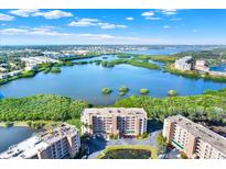 Aerial view of condo building with waterfront and city views at 6251 Shoreline Dr # 2102, St Petersburg, FL 33708