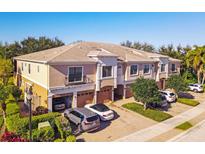 Condo building with attached garages and landscaping at 7219 Hamilton Rd # 7219, Bradenton, FL 34209