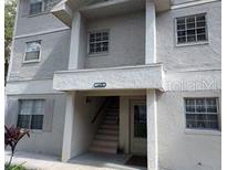 Exterior view of a two-story apartment building at 14430 Reuter Strasse Cir # 906, Tampa, FL 33613