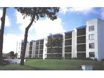 Exterior view of the building, showcasing its design at 2424 W Tampa Bay Blvd # 107, Tampa, FL 33607