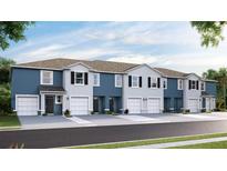 Exterior view of a row of townhouses with modern design and two-car garages at 11843 Davis Dr, Largo, FL 33774