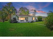 Charming ranch house with a well-manicured lawn at 4300 16Th N Ave, St Petersburg, FL 33713