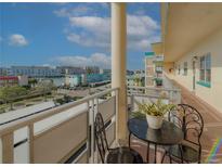 Spacious balcony with city views and seating for two at 2960 59Th S St # 509, Gulfport, FL 33707