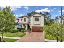 Stunning two-story home with brick driveway and landscaping at 4114 W Zelar St, Tampa, FL 33629