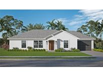 Single-story home with attached garage and landscaped yard at 0 Trapper John Rd, Weeki Wachee, FL 34614