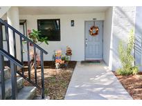 Inviting condo exterior with landscaping and walkway at 1901 Oyster Catcher Ln # 814, Clearwater, FL 33762