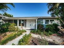 Charming single-story home with a landscaped front yard at 13191 92Nd Ave, Seminole, FL 33776