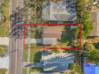 Aerial view of a single-Gathering home with a yard at 4910 Chancellor Ne St, St Petersburg, FL 33703