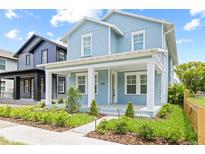 Charming two-story light blue house at 408 1/2 E Oak Ave # 5, Tampa, FL 33602