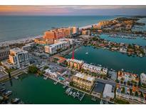 Aerial view showcasing the property's location near the water at 120 Brightwater Dr # 2, Clearwater Beach, FL 33767