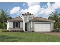 One-story home with light gray siding, white garage door at 11705 Myakka Blue Dr, Venice, FL 34293