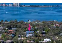 Aerial view showcasing a waterfront home and its surroundings at 316 Jasmine Way, Clearwater, FL 33756