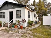 Cozy house with a walkway and potted plants at 3102 W Leroy St # A, Tampa, FL 33607
