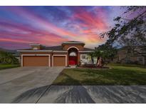 Beautiful house exterior at sunset at 805 Seminole Sky Dr, Ruskin, FL 33570