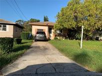 Single-story home with driveway and front yard at 2401 42Nd S St, St Petersburg, FL 33711