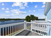 Deck overlooking a beautiful riverfront landscape at 3825 Pompano Se Dr, St Petersburg, FL 33705