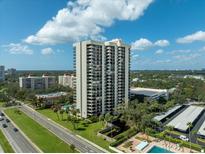 High-rise building with pool and parking at 2413 Bayshore Blvd # 1401, Tampa, FL 33629