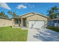 Newly built home with a one car garage at 2010 1/2 E Wood St # St, Tampa, FL 33604