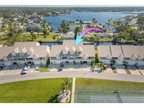 Waterfront townhouses with private boat docks and a tennis court at 8246 Aquila St, Port Richey, FL 34668
