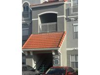 Exterior view of building with red tile roof at 18001 Richmond Place Dr # 425, Tampa, FL 33647