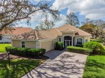 Single-Gathering home with garage and landscaped yard at 5195 Highbury Cir, Sarasota, FL 34238