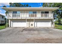 Two-story building with private balconies and garages at 2937 Bough Ave # D, Clearwater, FL 33760