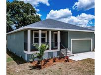 Newly built home with modern exterior at 107 6Th Nw Ave, Ruskin, FL 33570