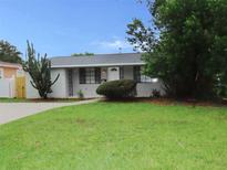 House exterior showcasing a well-maintained lawn and landscaping at 3120 25Th N St, St Petersburg, FL 33713