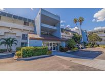 Building exterior showcasing entrance and parking at 5281 Isla Key S Blvd # 206, St Petersburg, FL 33715