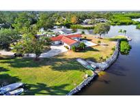 Waterfront home with expansive lot and private dock at 853 Seacrest Dr, Largo, FL 33771