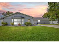 Charming one-story home with landscaped lawn at 7343 Brookview Cir, Tampa, FL 33634