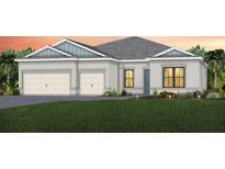 Two-story home with a three-car garage and attractive landscaping at 5015 Stoney Point Gln, Lakewood Ranch, FL 34211