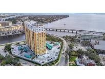 Aerial view of a luxury high-rise building with waterfront access and city views at 345 Bayshore Blvd # 610, Tampa, FL 33606
