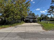 House with carport, and driveway at 6809 N Boulevard, Tampa, FL 33604