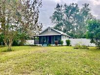 Charming one-story house with large yard at 1306 Bonnie Rd, Plant City, FL 33563